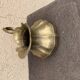 Vintage brass pitcher with "petal" patterns — decorative S-shaped handle, 1950s.