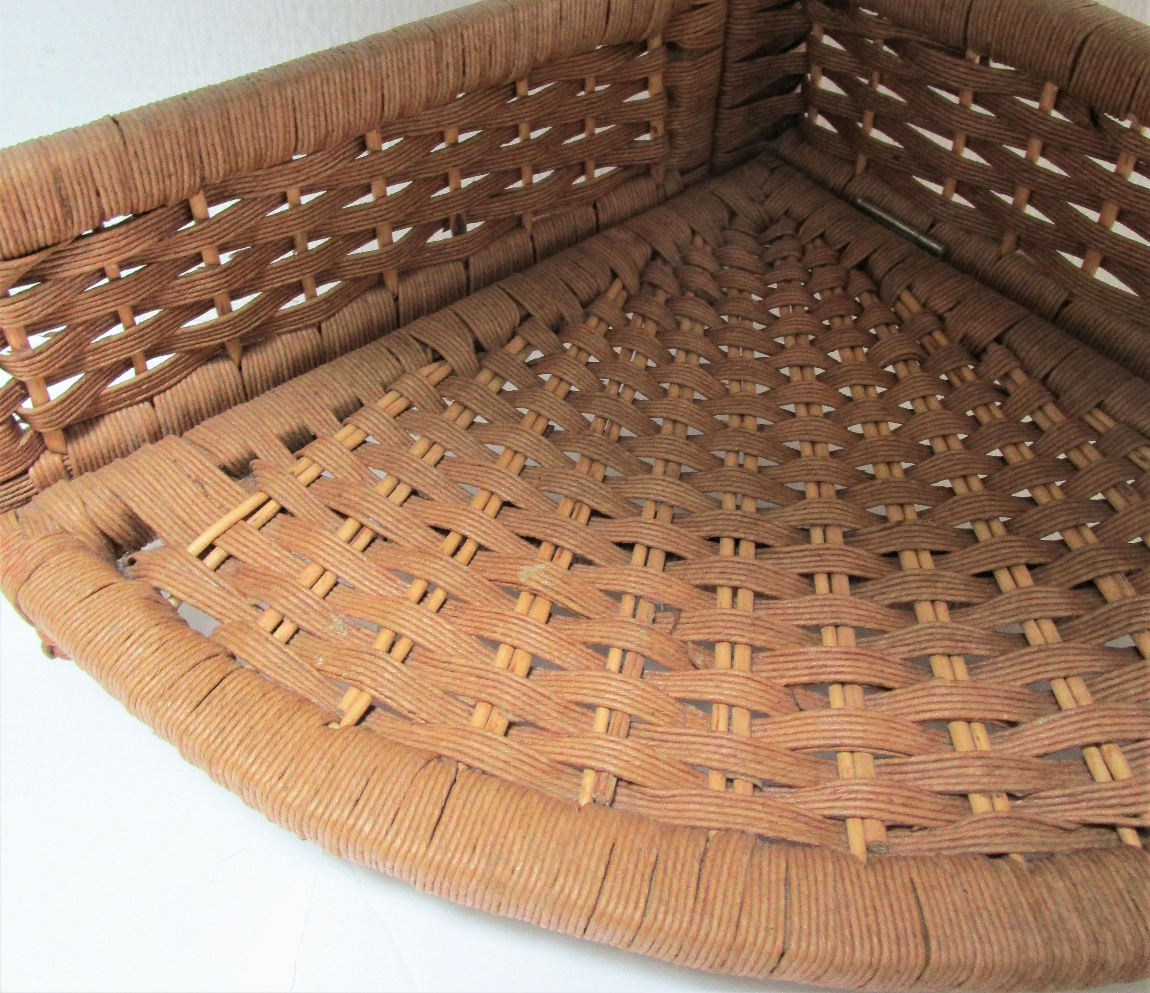 Corner shelf made of vintage braided natural fibers