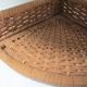 Corner shelf made of vintage braided natural fibers