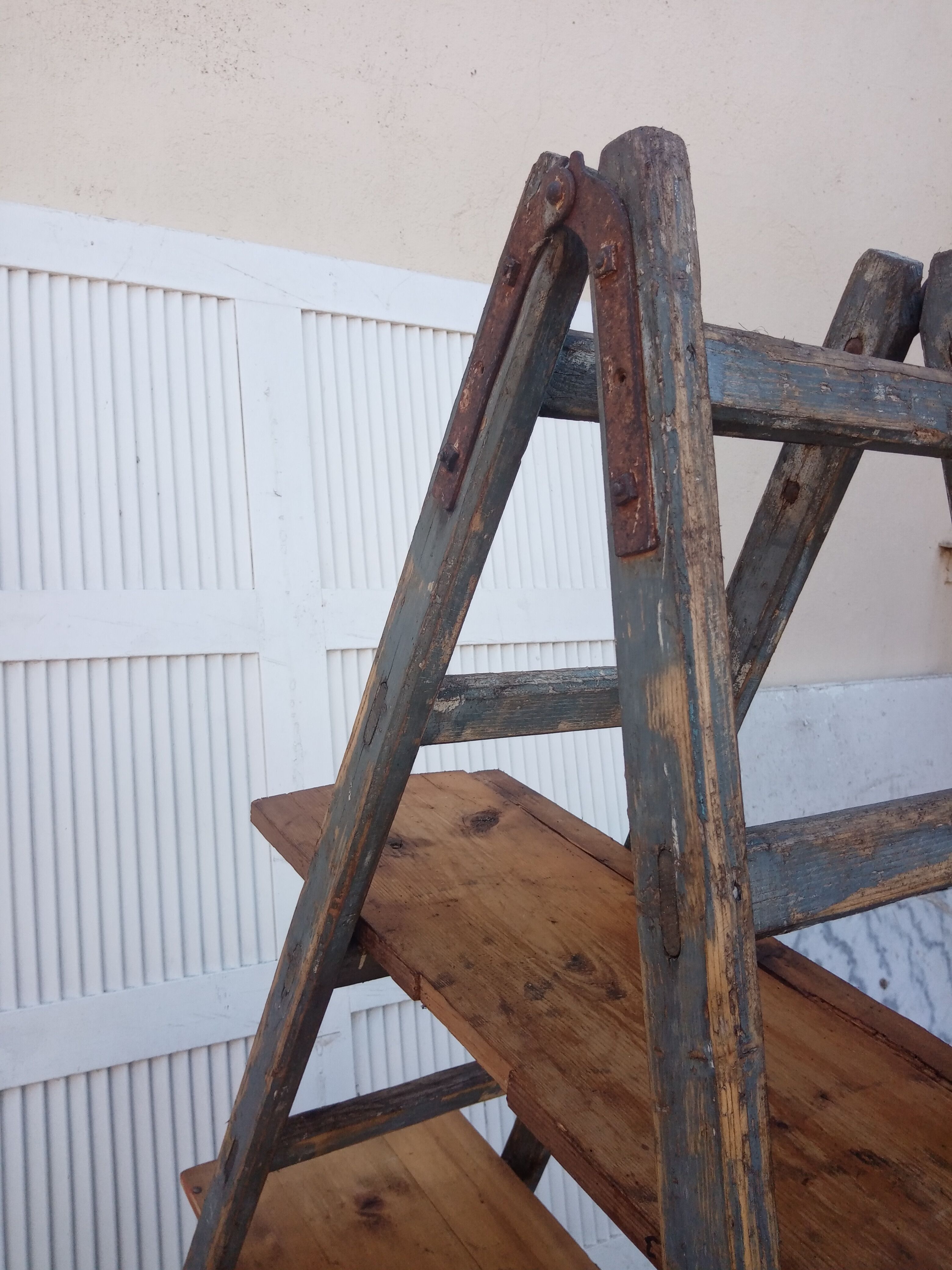 Old stepladder wooden shelf