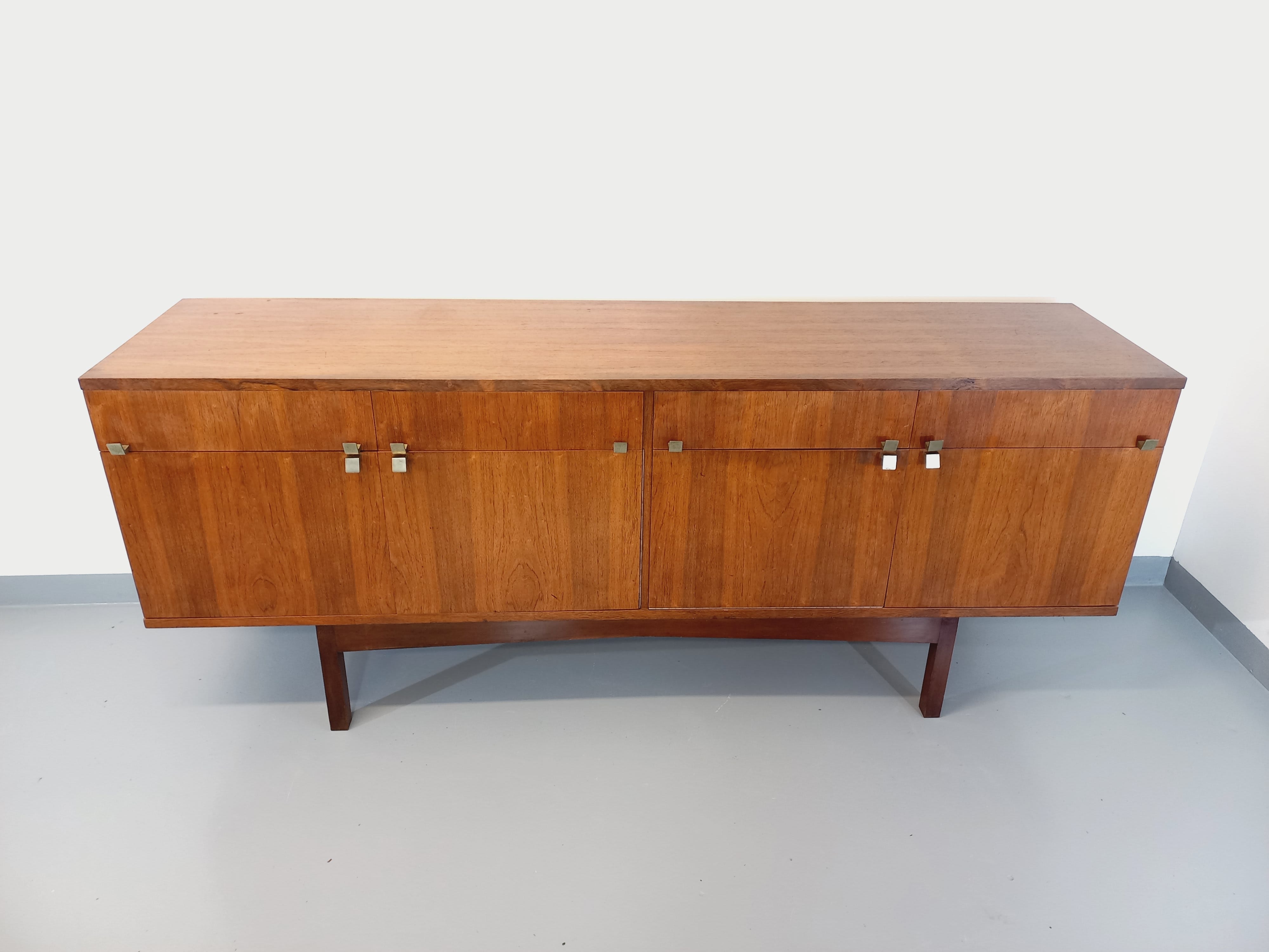 Vintage Scandinavian style row in rosewood and brass from the 60s