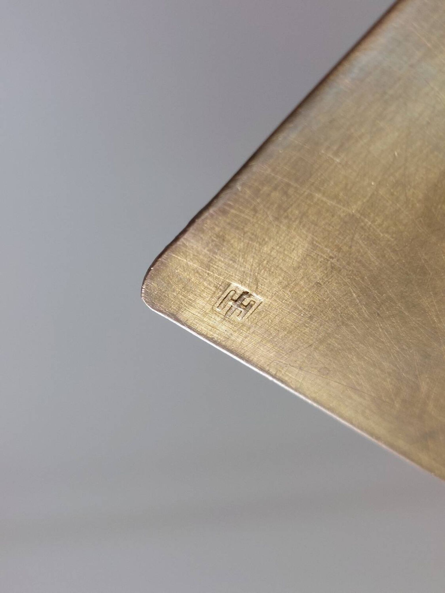 Pair of hand-hammered brass bookends by Hayno Focken