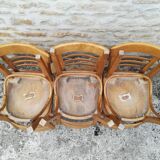 12 varnished bistro chairs