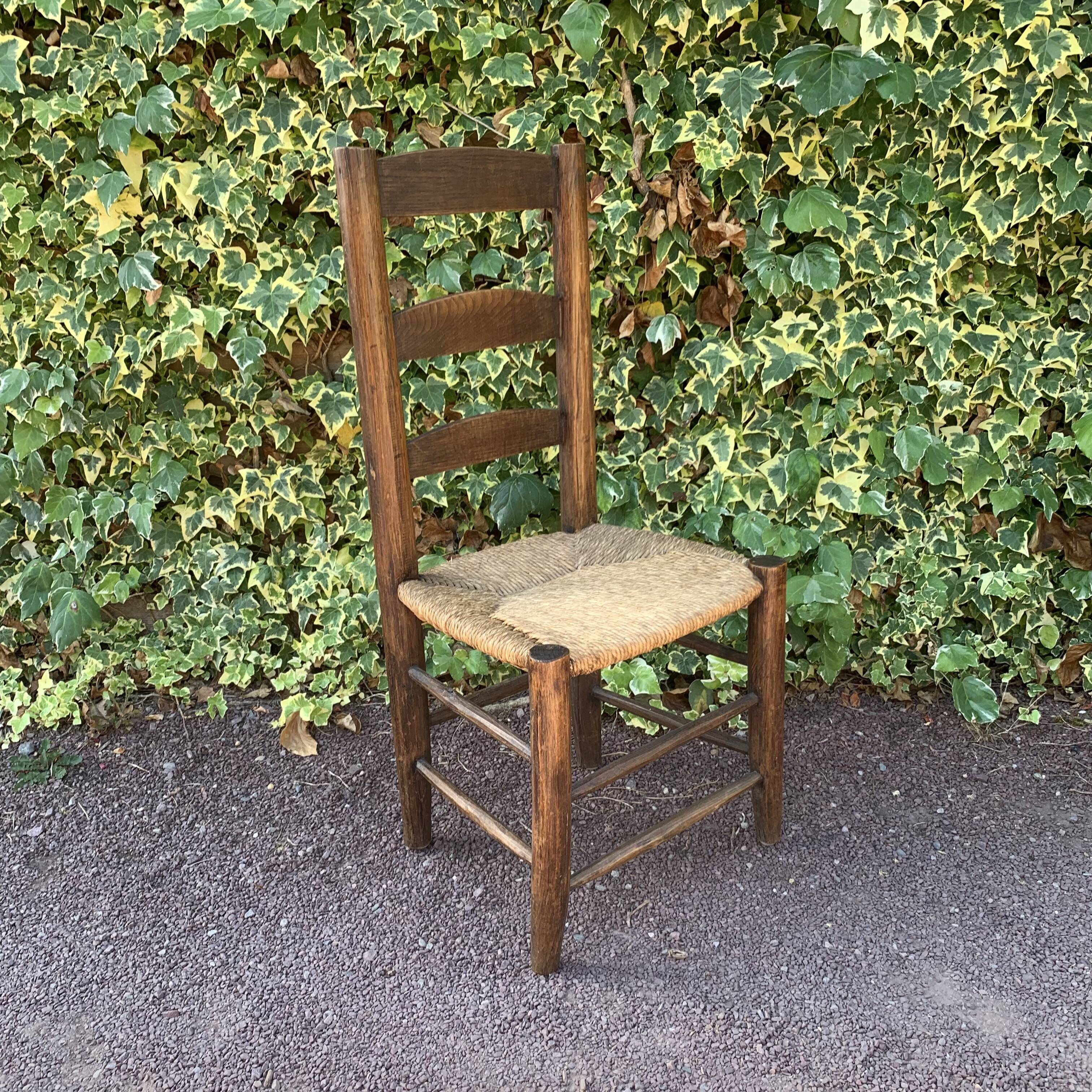 Set of 4 handcrafted rush chairs in solid oak.
