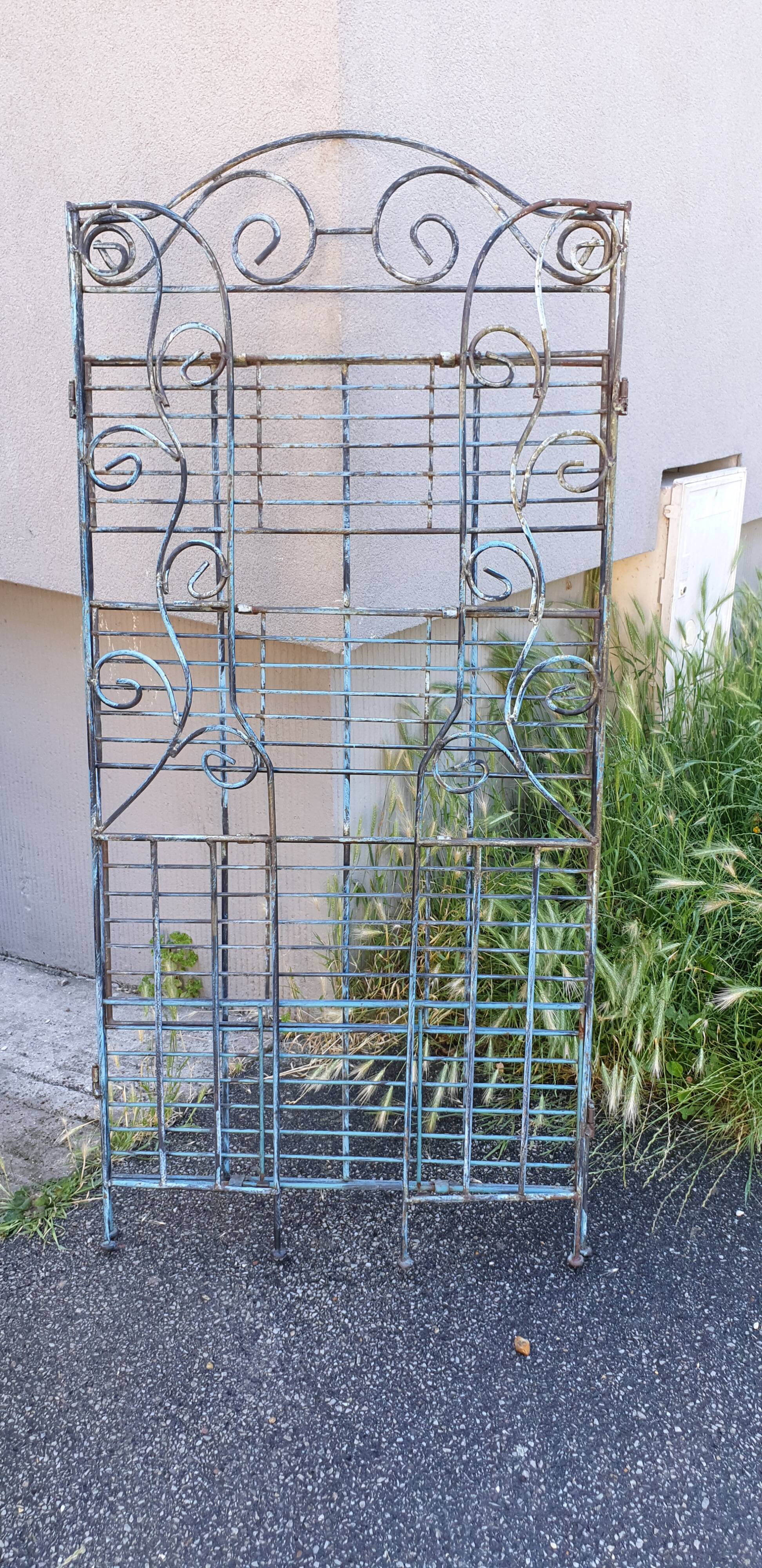 Wrought iron shelf on worked feet