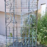 Wrought iron shelf on worked feet