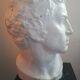 Patinated plaster man head.