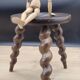 Tripod stool with turned legs