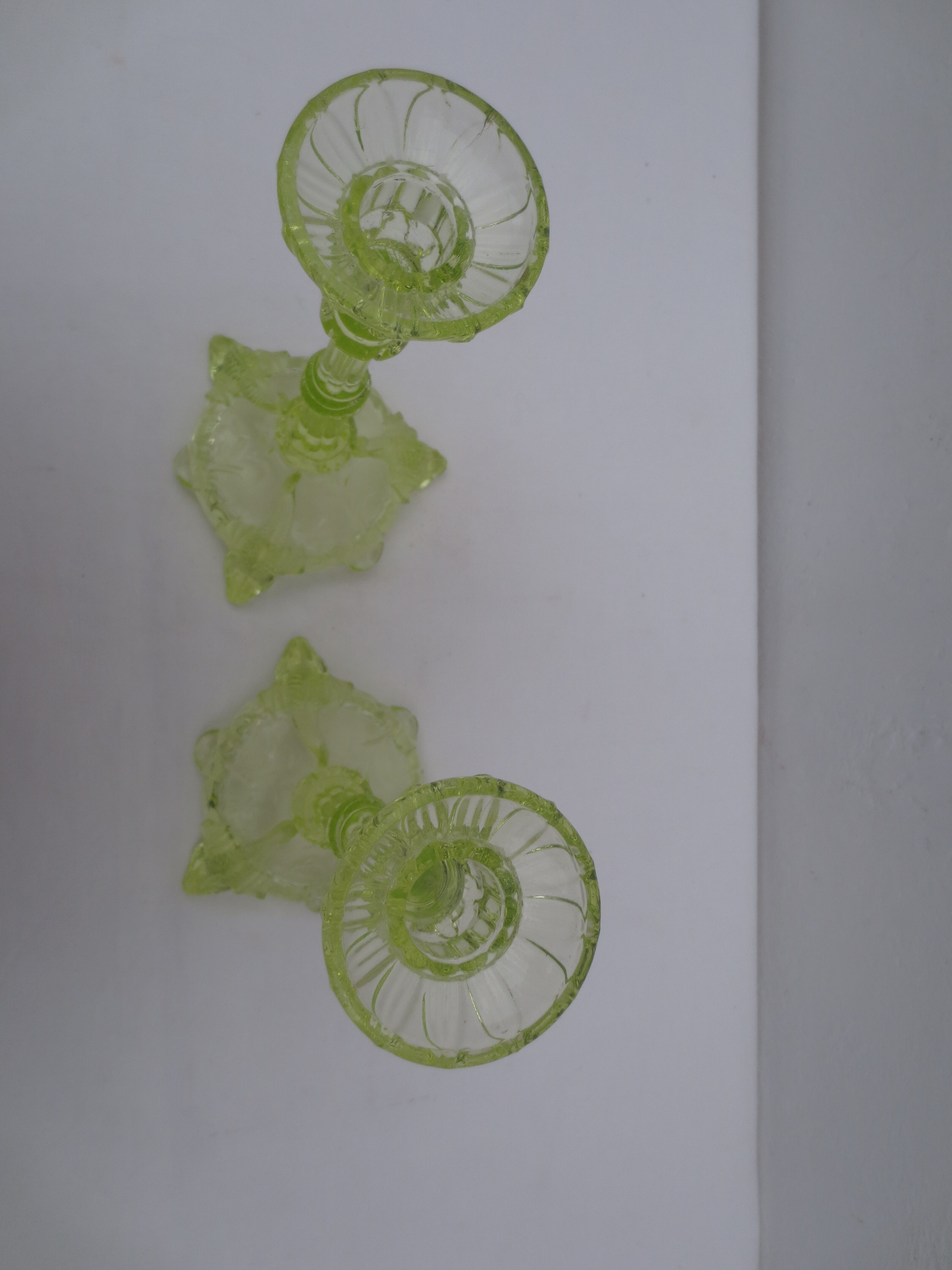 pair of old anise-green glass candlesticks