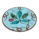 Old small compote dish in turquoise majolica with raised floral decoration.