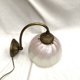 Brass wall light with a glass globe dimension: height -21cm- width -27cm-
