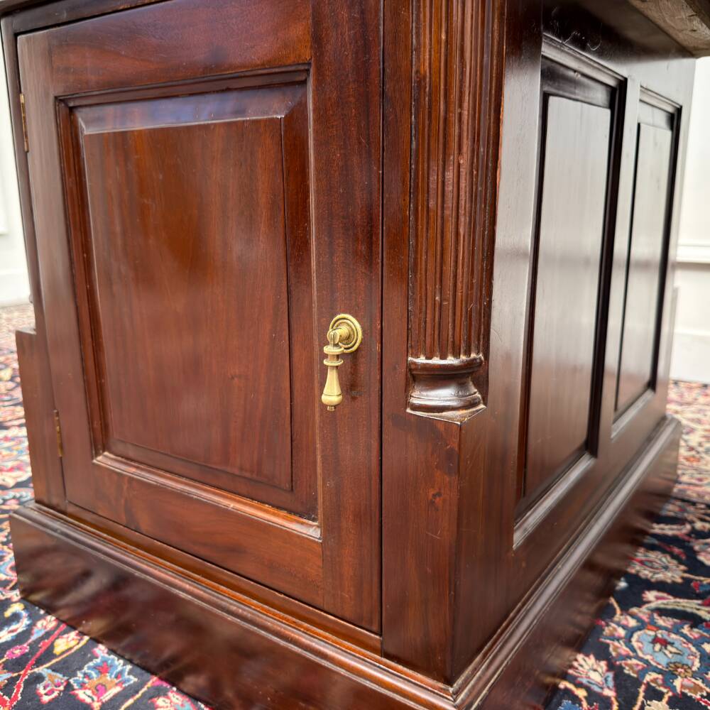 Classic English desk with green leather inlay.