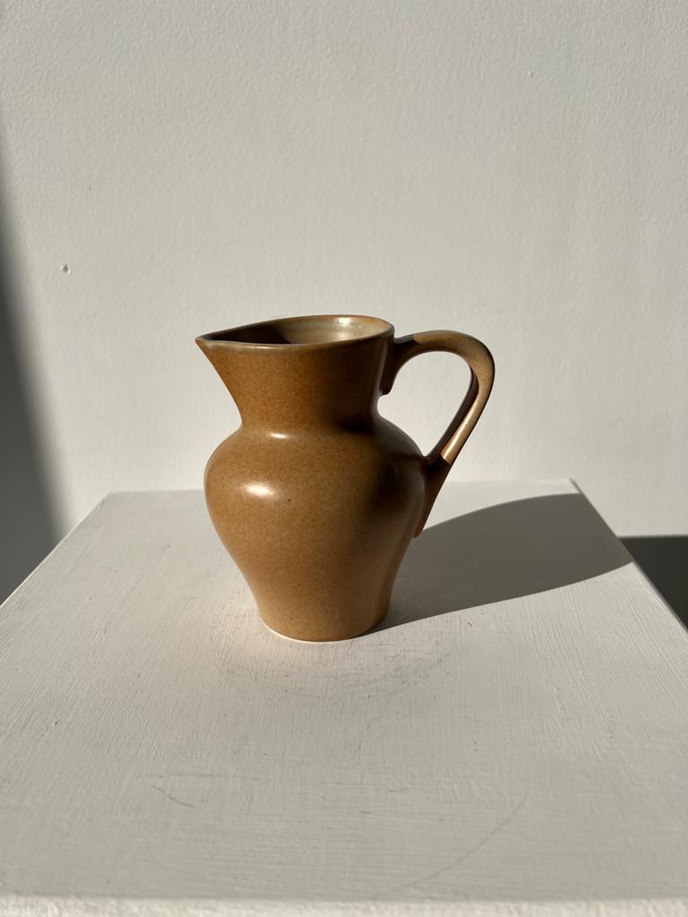 Pitcher in light beige sandstone