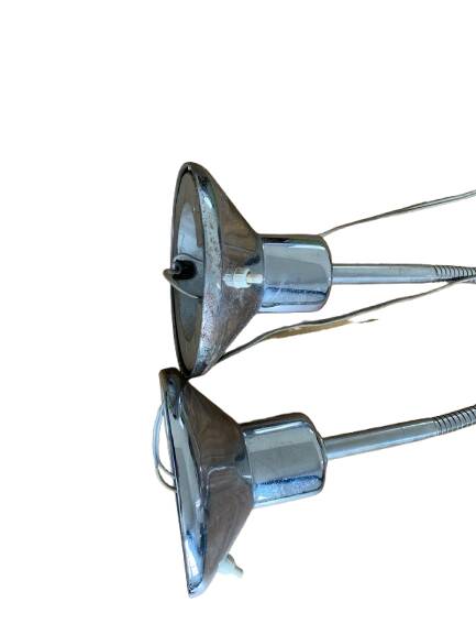 Pair of vintage chrome metal desk lamps with adjustable goosenecks.