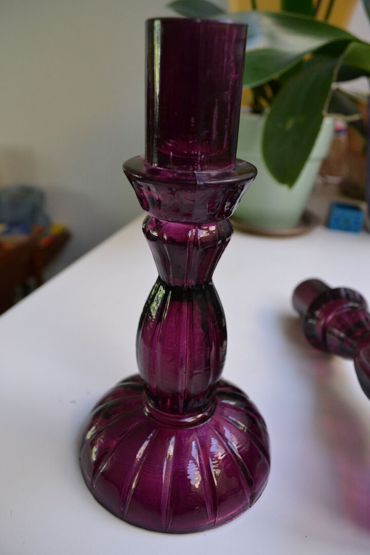 Pair of purple glass candlesticks