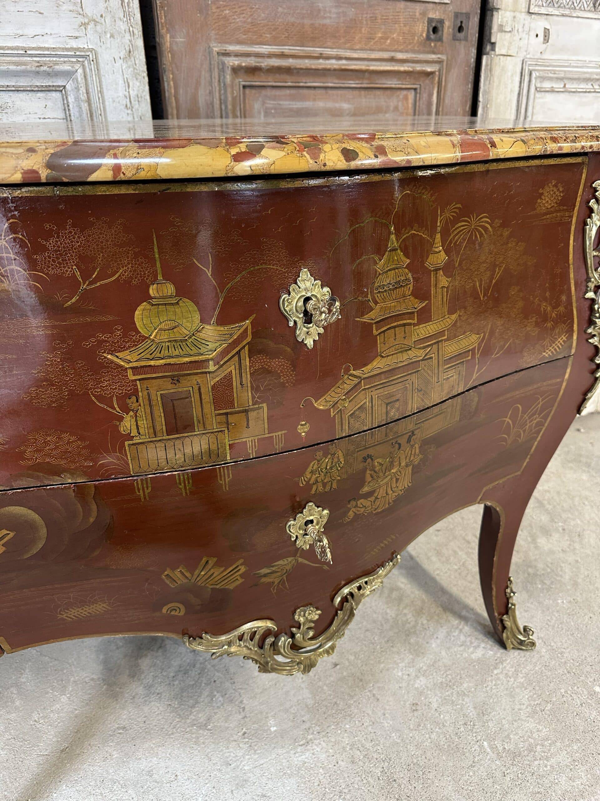 Louis XV style commode in red lacquer from the 1900s.