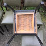 Vintage chairs guariche stone in Skaï green bottle and base in metal square tube.