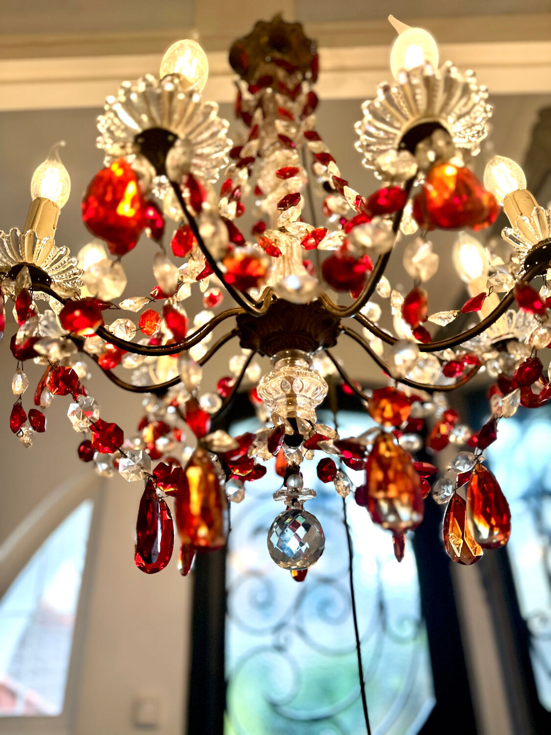 Antique chandelier with red crystal pendants, 9 lights.