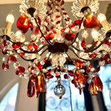 Antique chandelier with red crystal pendants, 9 lights.