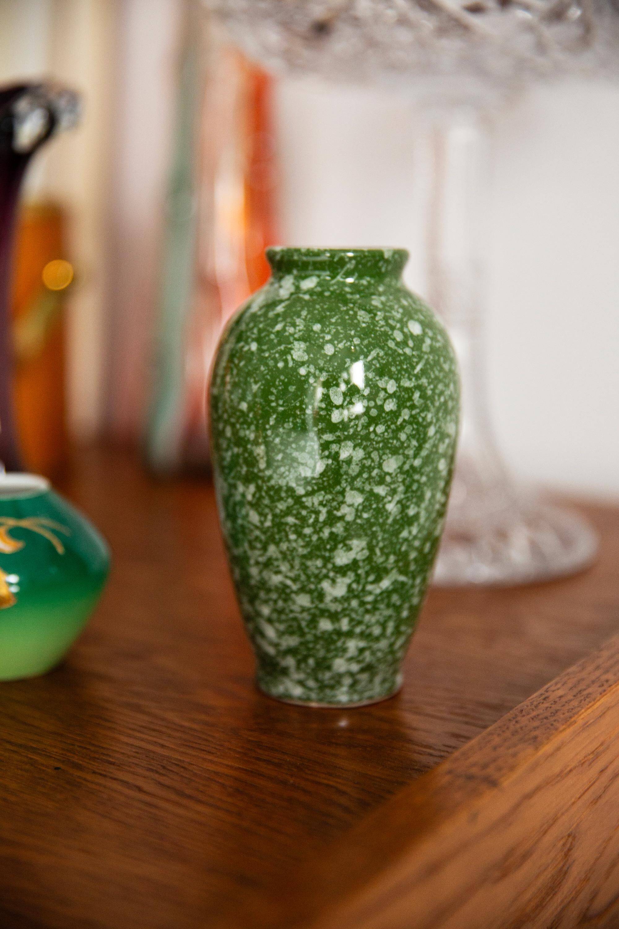 Hand-painted green porcelain vase, mid-20th century.