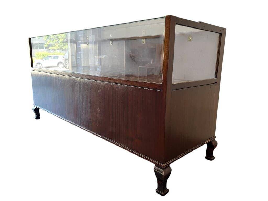 Vintage wooden shop counter/display case.