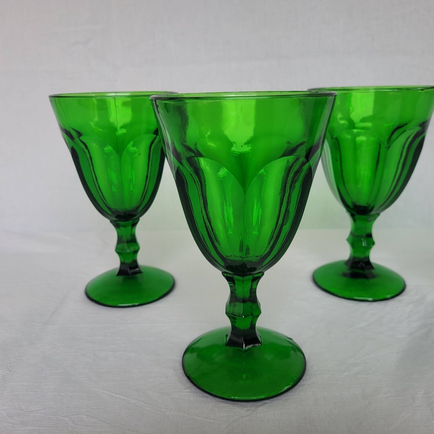 4 green footed glasses in moulded glass – 1970s