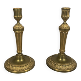 Pair of Louis XVI Candle Holders in Chiselled and Gilded Bronze.