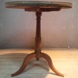 Gueridon circulaire dessu marbre blanc