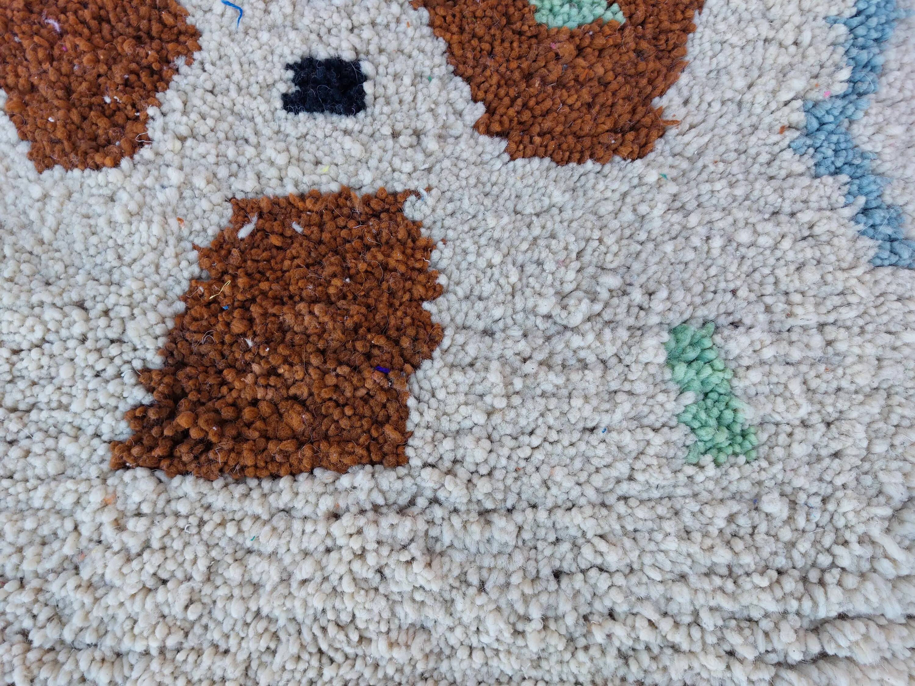 Moroccan handwoven wool rug, 250x150 cm, traditional style.