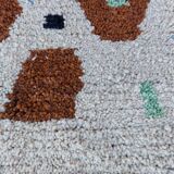 Moroccan handwoven wool rug, 250x150 cm, traditional style.