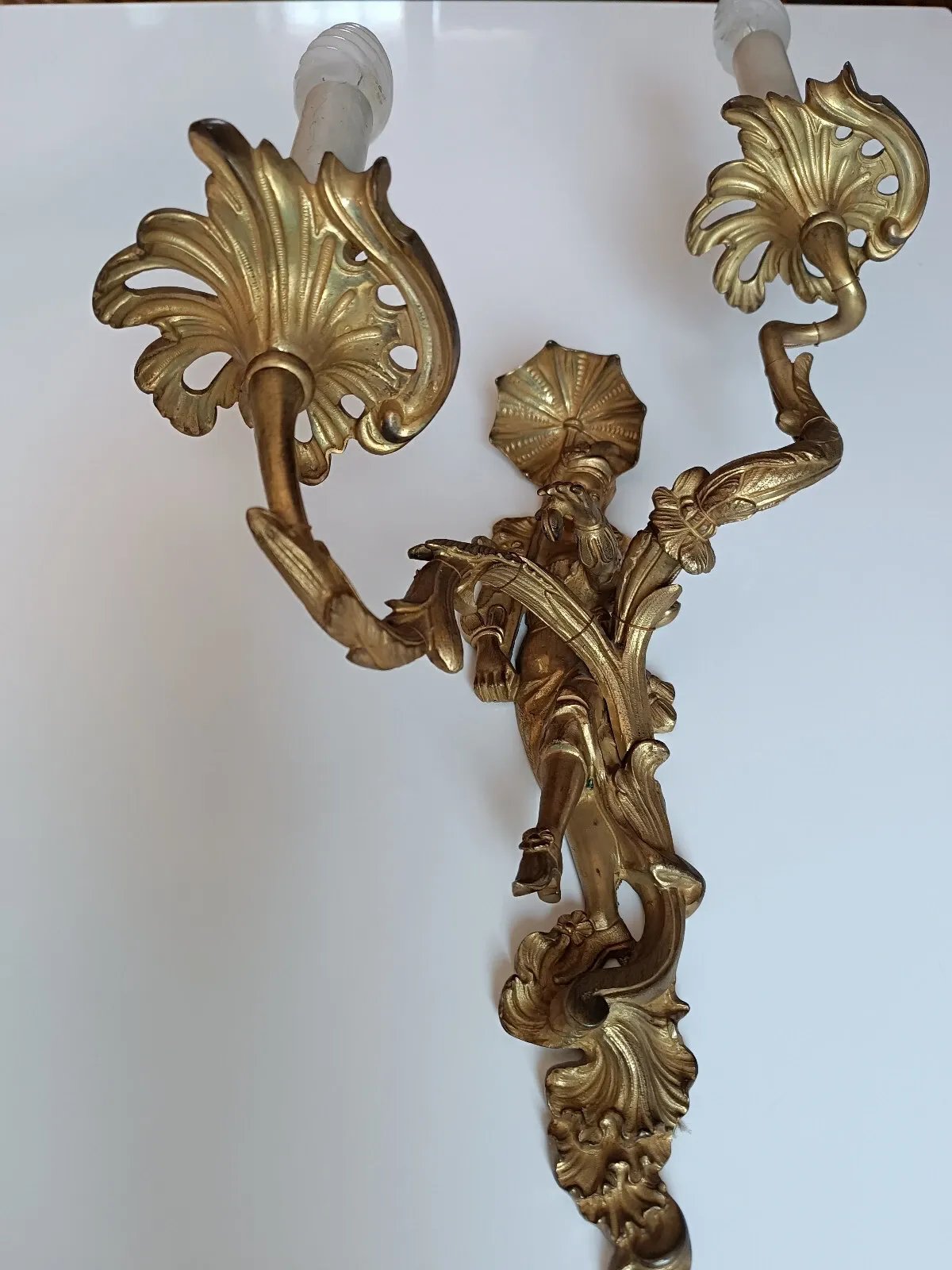 Pair of Régence style wall sconces in gilded bronze