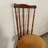 Wooden chair with yellow velvet