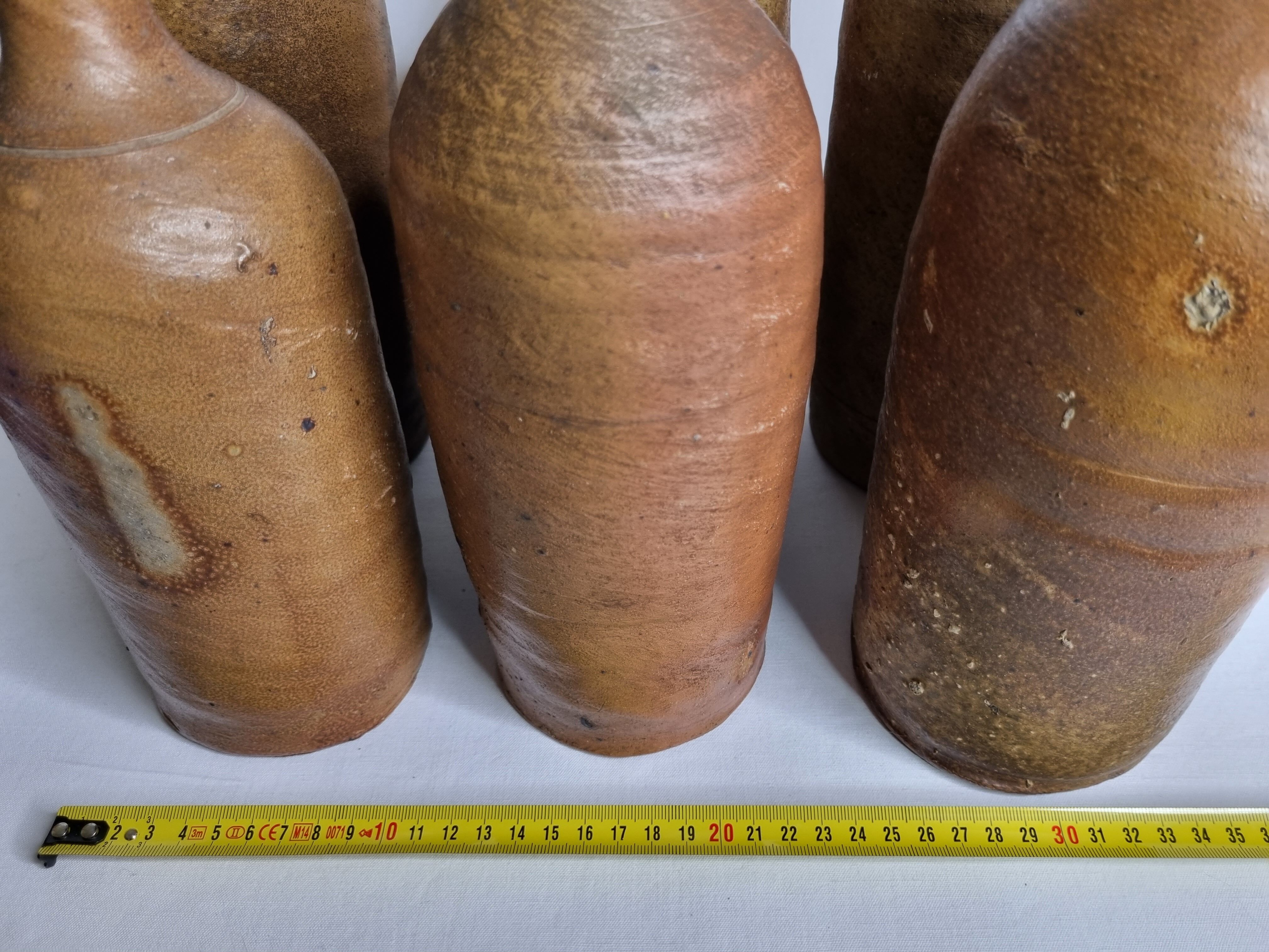 Set of 6 hand-turned stoneware bottles, 31 cm