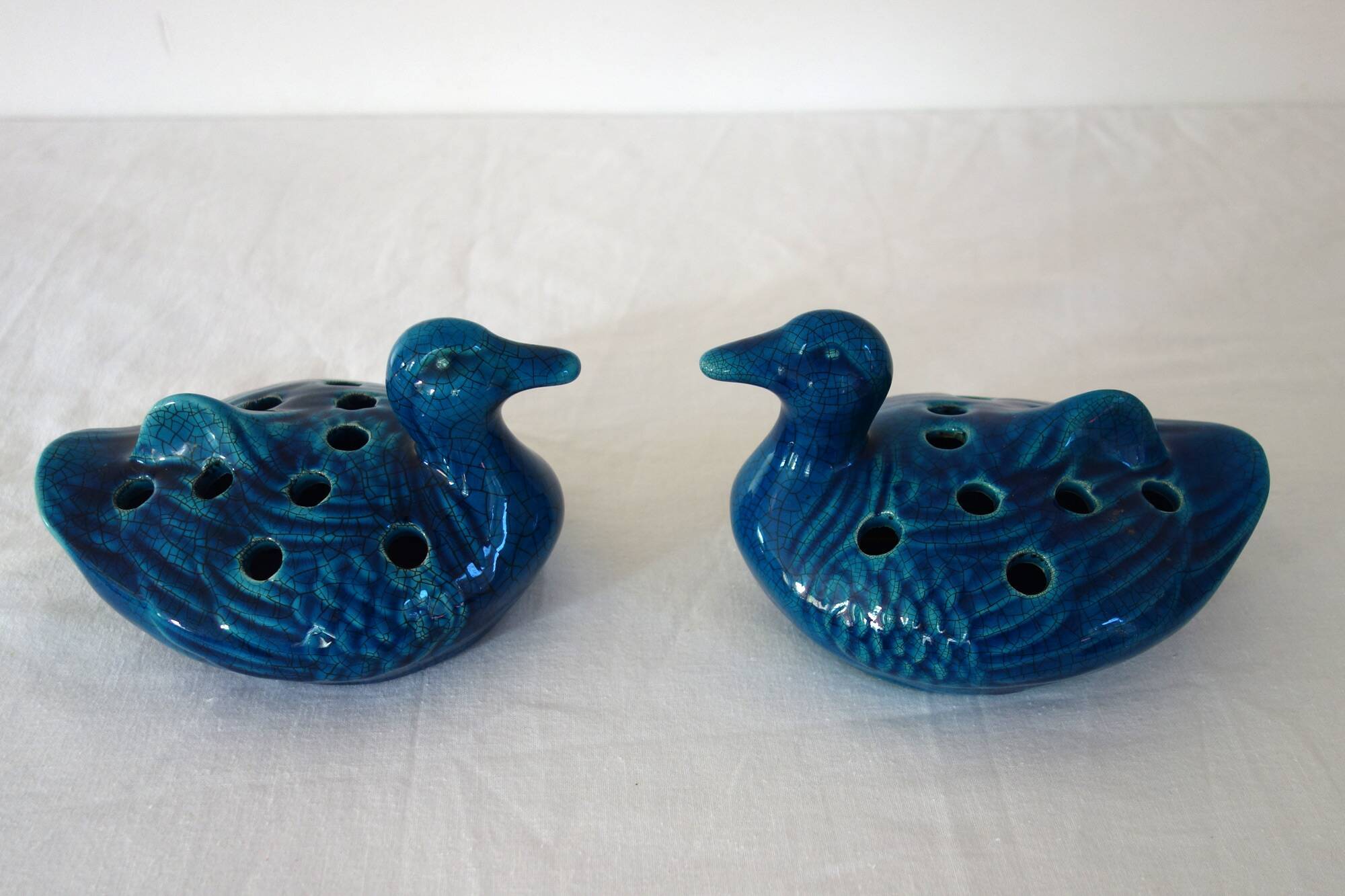 2 blue ceramic duck flower picks