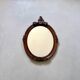 Miroir mural en bois vintage avec ornements floraux – Miroir ovale