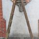 Old wooden stepladder stamped