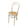 Curved wooden bistro chair and canned seat