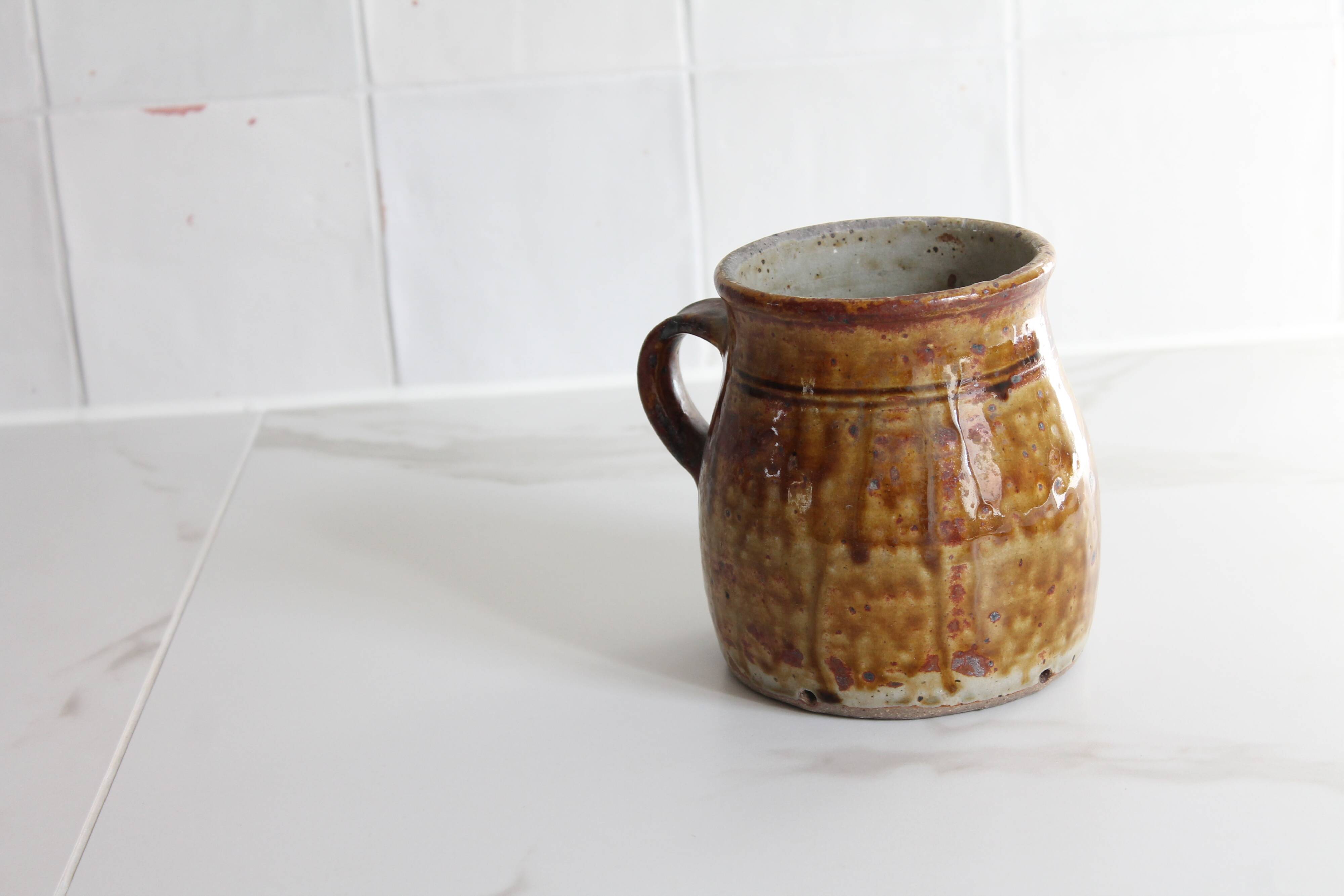 Ancient ceramic cream pot, pyrite stoneware, glazed from La Borne, France.