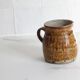 Ancient ceramic cream pot, pyrite stoneware, glazed from La Borne, France.