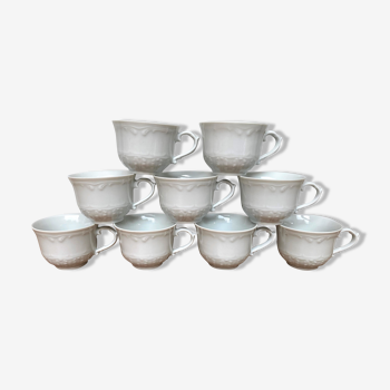 Set of 9 white porcelain cups