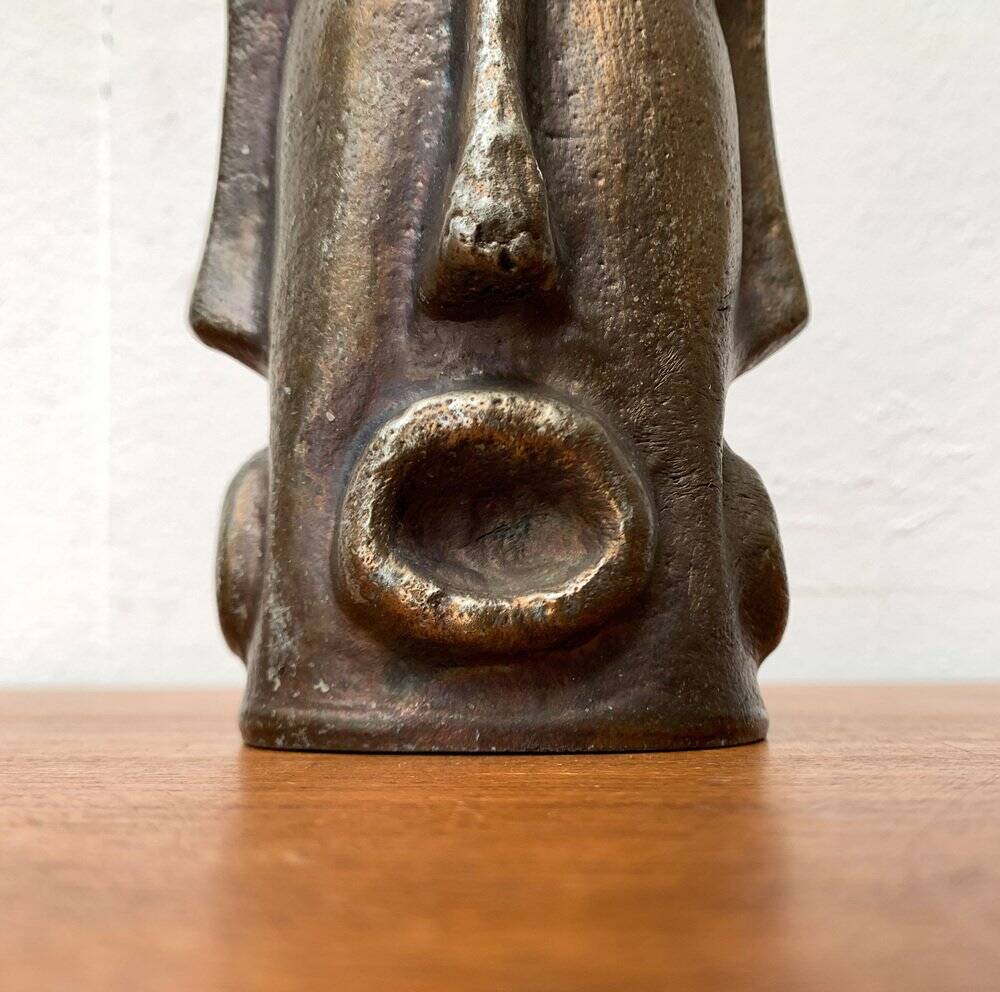 Abstract vase with a brutalist bronze face from the mid-century.