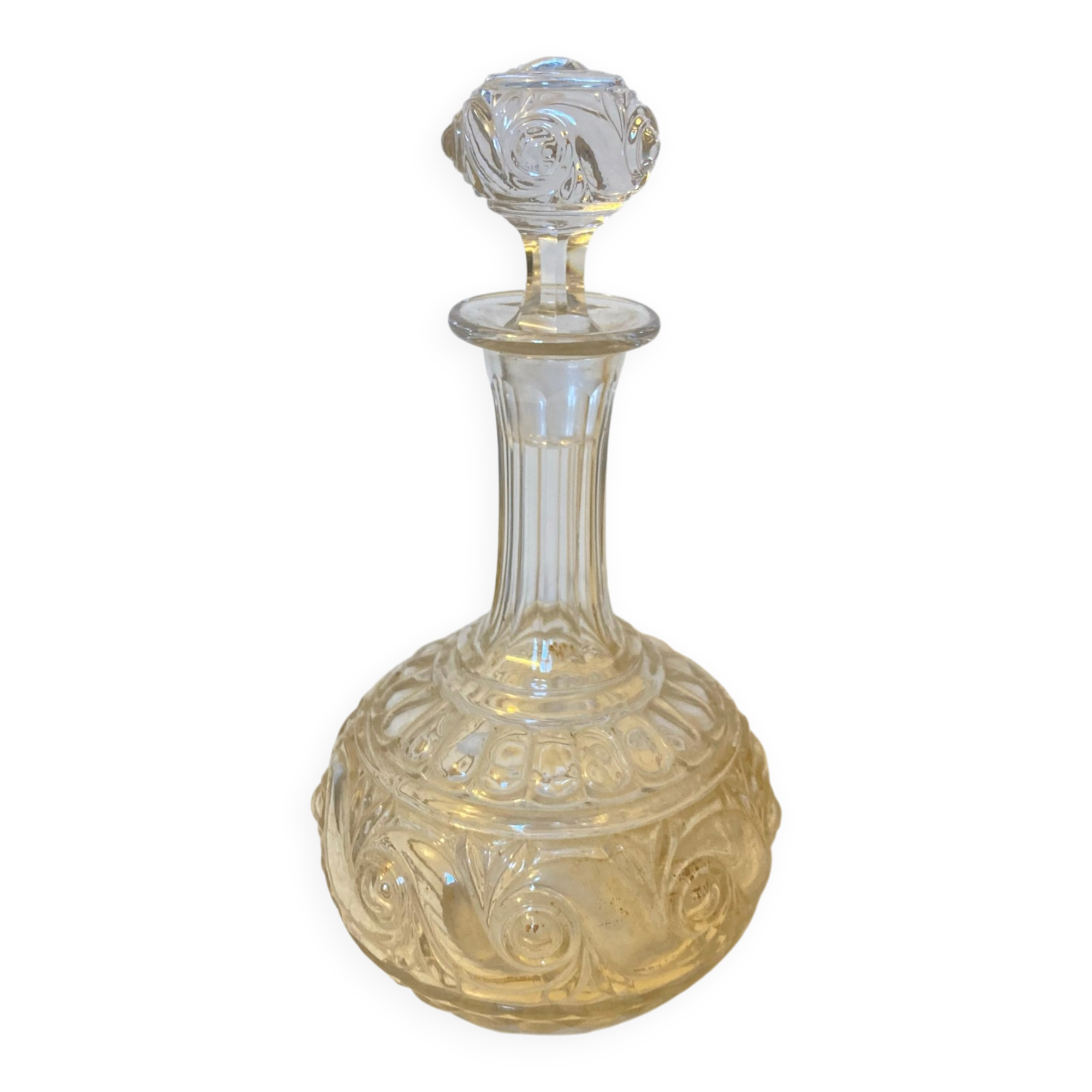 19th-century liqueur carafe in glass adorned with relief patterns.