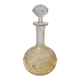 19th-century liqueur carafe in glass adorned with relief patterns.