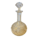 19th-century liqueur carafe in glass adorned with relief patterns.