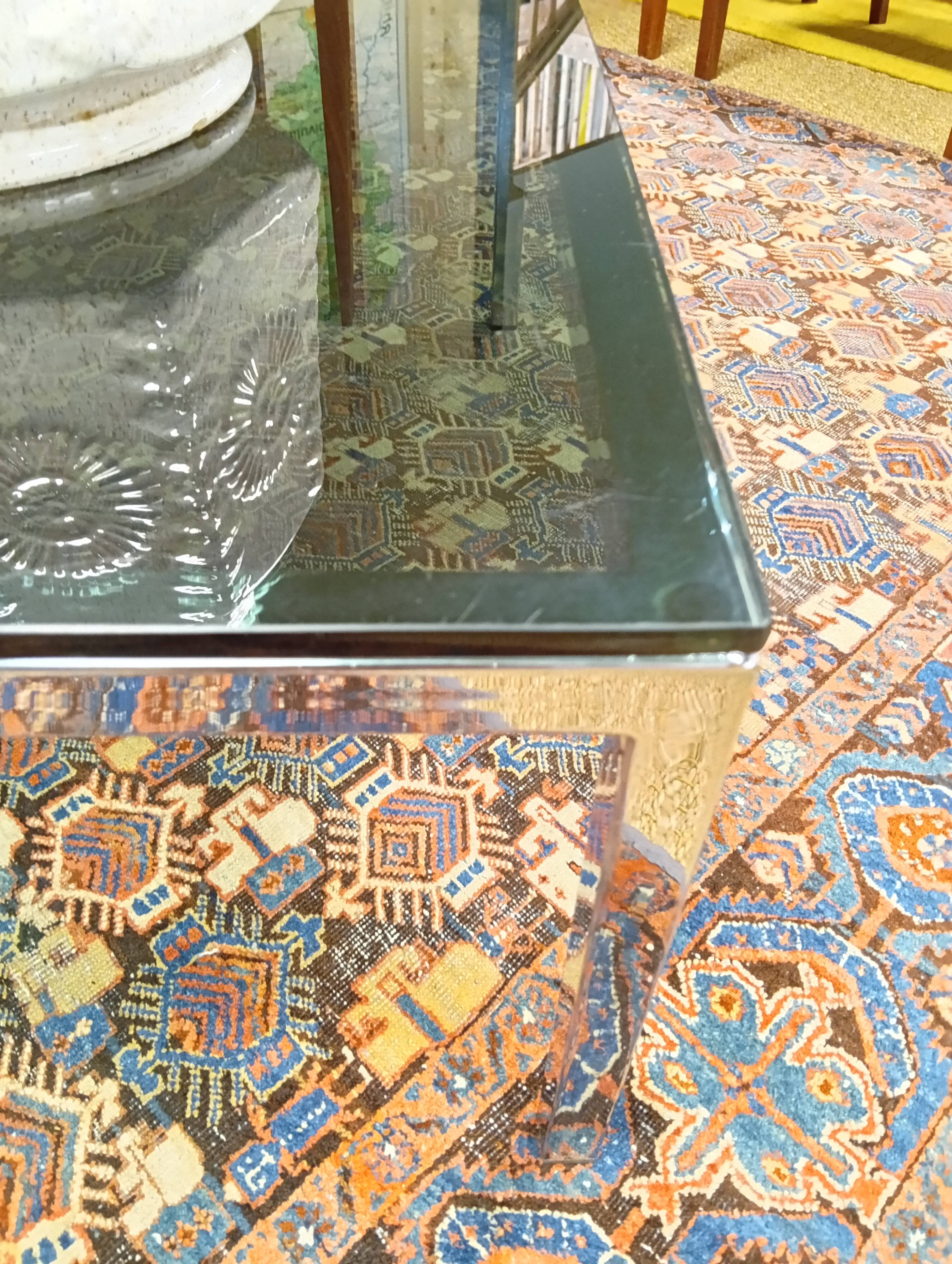 Chrome coffee table with a glass top from the 1980s.