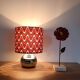 Vintage table lamp with printed shade featuring seventies waves.