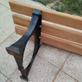 Garden bench with old cast iron legs