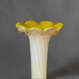 Blown glass vase from Murano in the shape of a yellow flower.