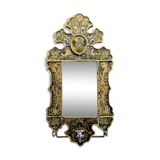 Eglomise glass mirror with scrollwork and branch races decoration