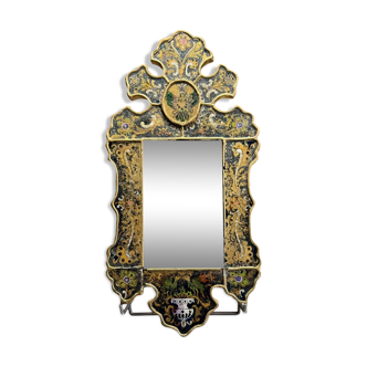 Eglomise glass mirror with scrollwork and branch races decoration
